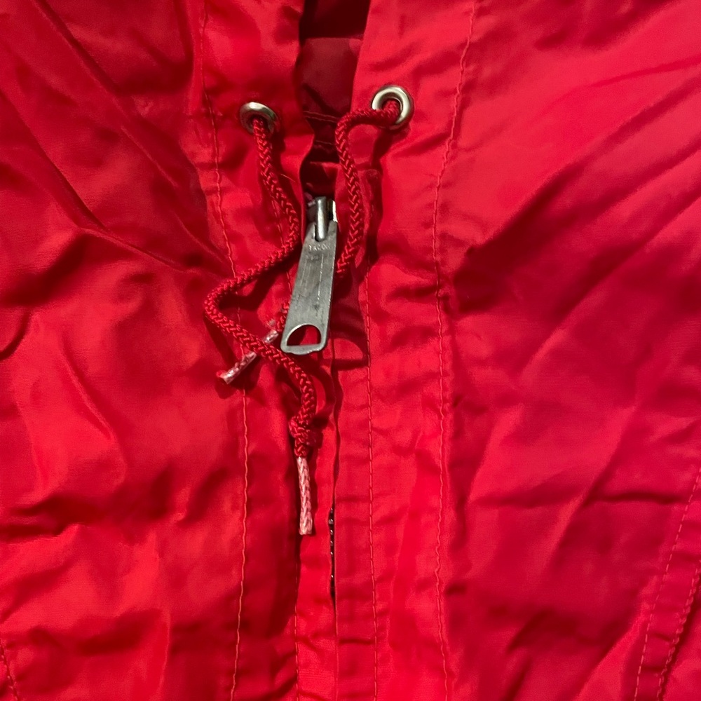 Vintage-style red windbreaker
